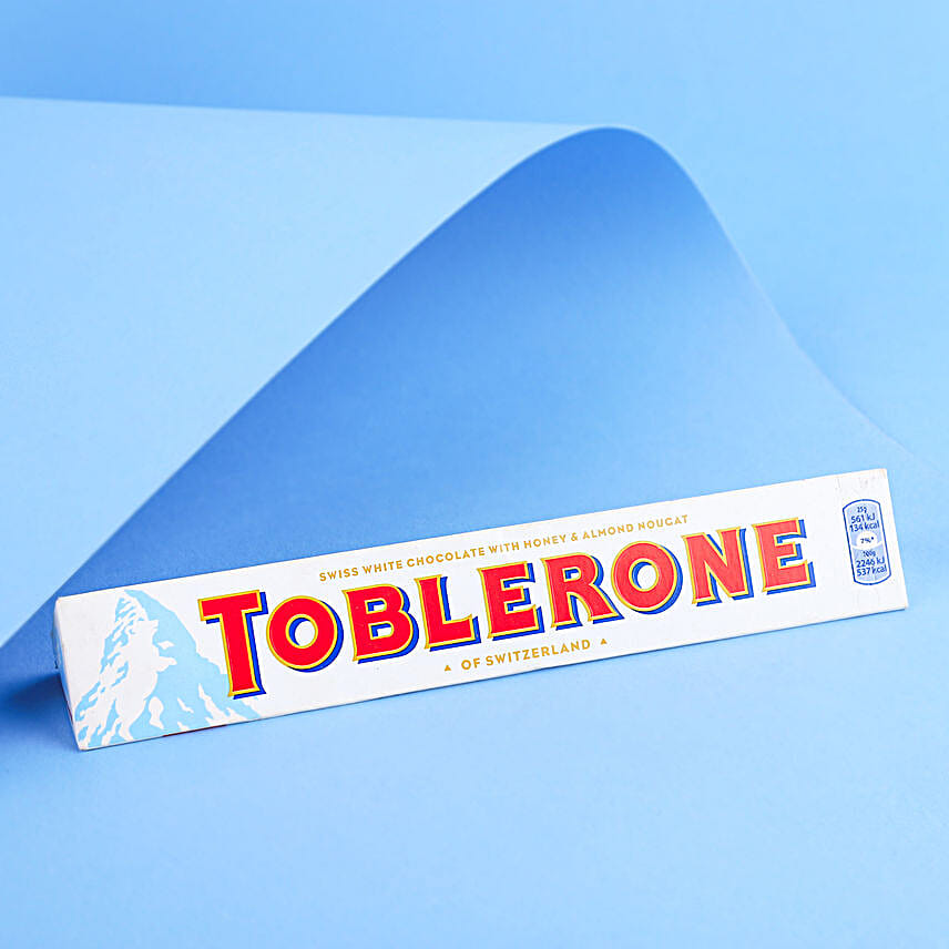 Intricate Trishul Rakhi N Toblerone Delight