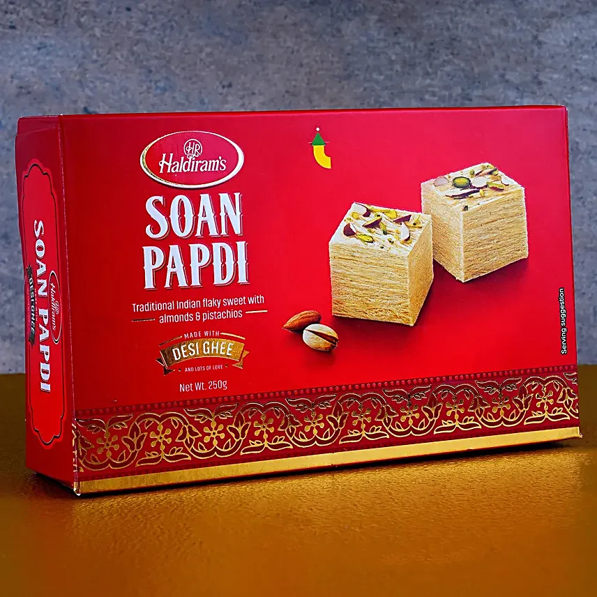 Melodic Krishna Rakhi For Kids N Delectable Soan Papdi Gift Set
