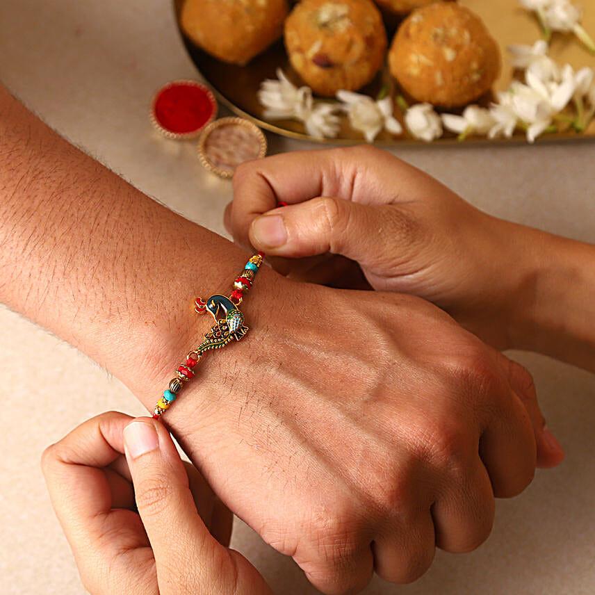 Sneh Elegant Peacock Rakhi & Almonds