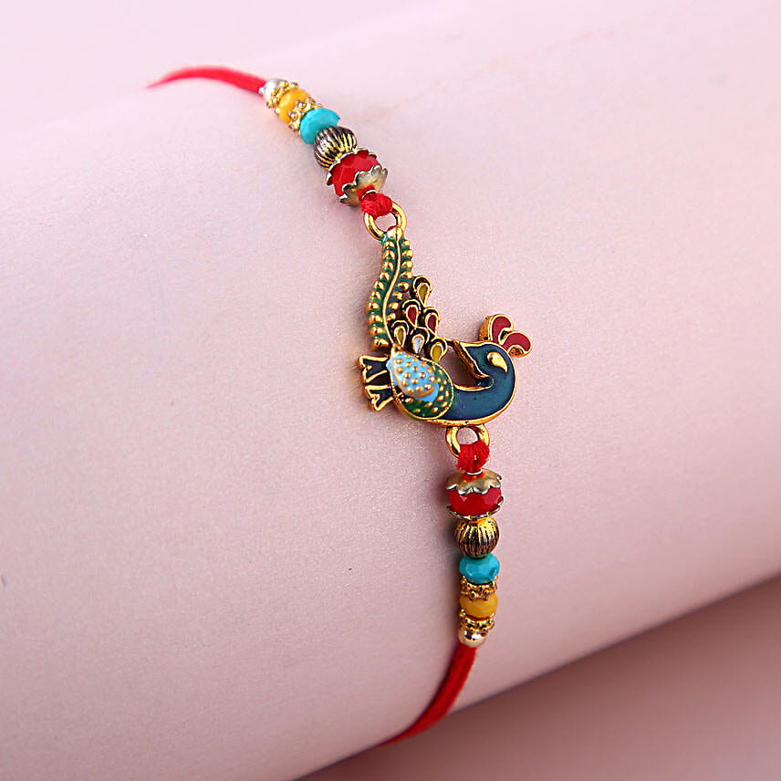 Sneh Elegant Peacock Rakhi & Ferrero Rocher