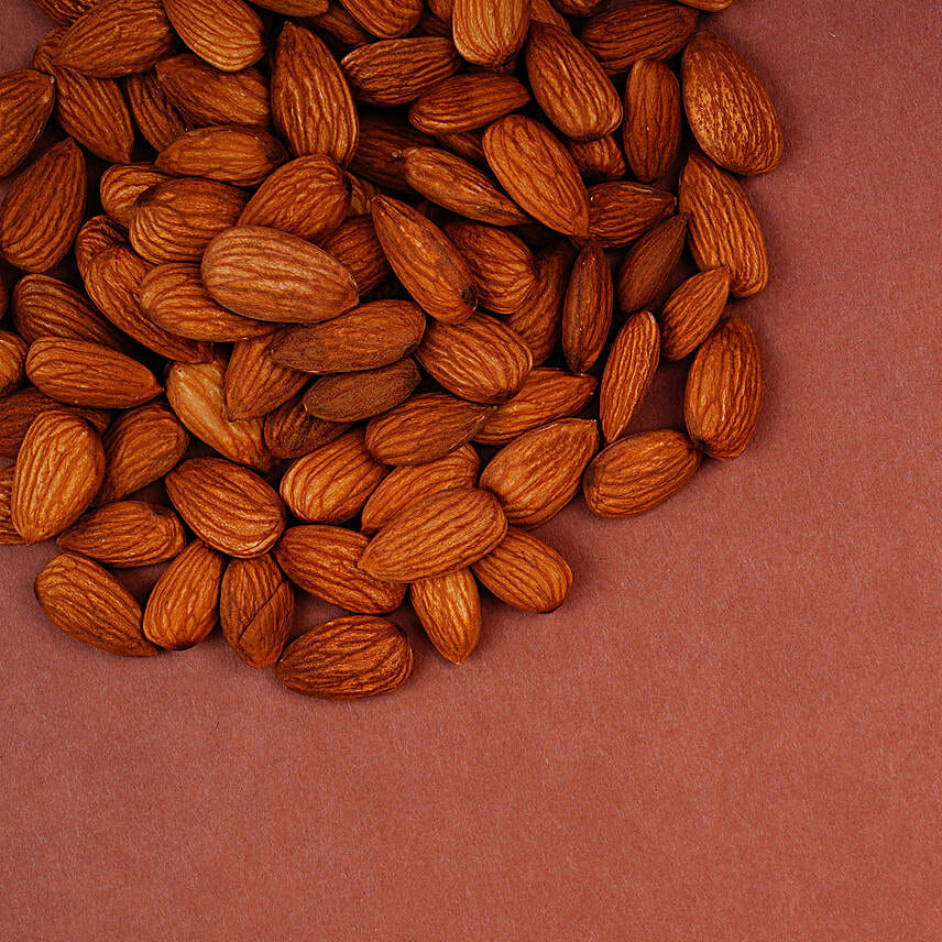 Traditional Pearl Mauli Rakhi And Healthy Almonds