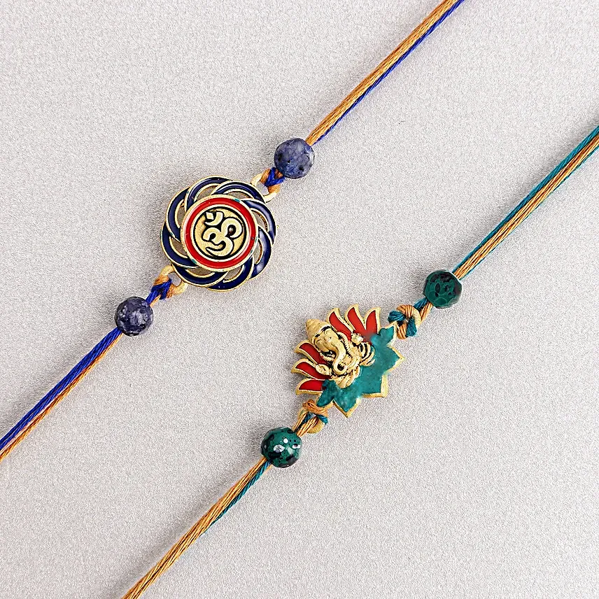 Vibrant Ganesh and Om Rakhi Duo N Sweetness Set
