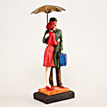 Couple Under Umbrella With Suitcase Figurine