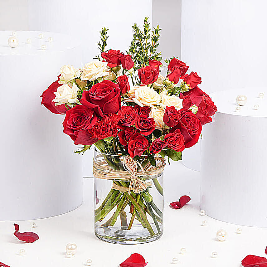 Red and Peach Roses in a Vase