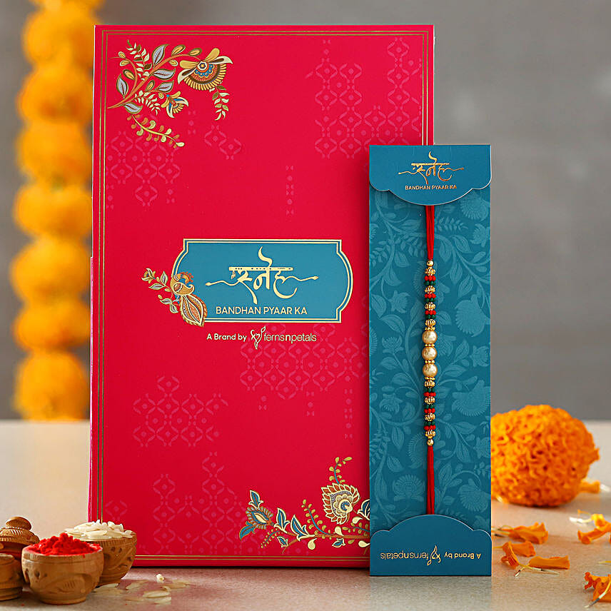 Traditional Pearl Studded Mauli Rakhi
