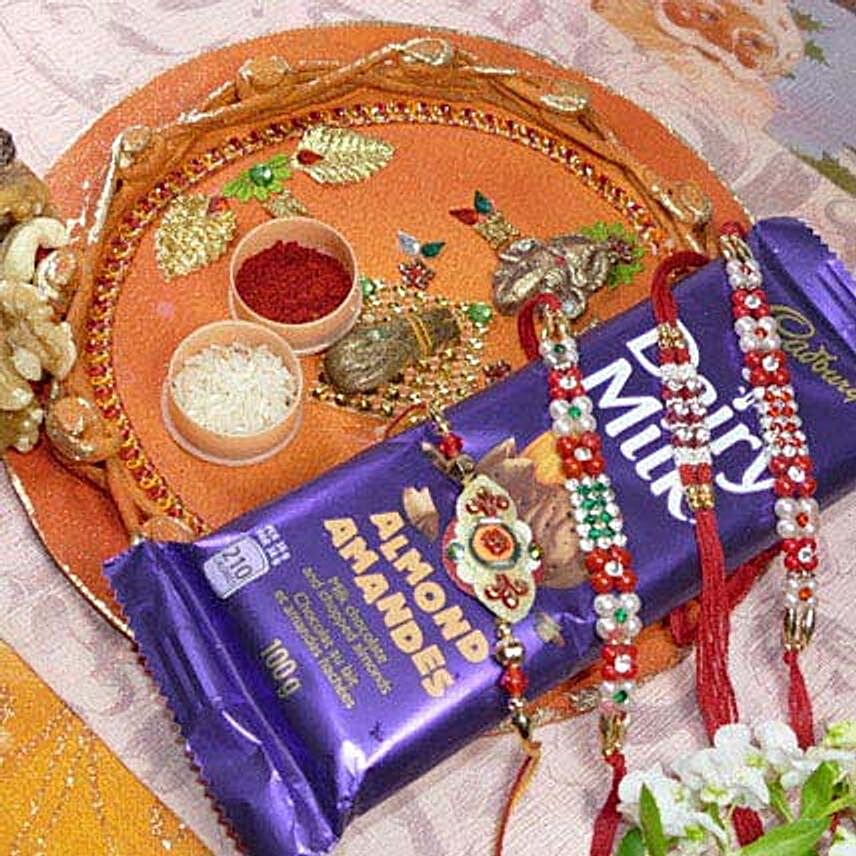 Red Beads Rakhi 4 With Dairy Milk Mixed Dry Fruits Thali