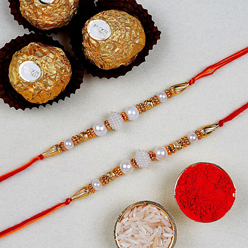 Divine Golden Pearl Thread Rakhi With 3 Pcs Ferrero Rocher