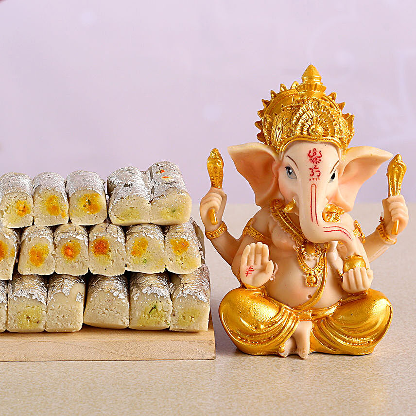 Divine Ganesha Idol With Kaju Pista Roll