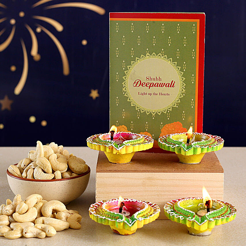 Floral Diyas With Greeting Card And Cashews