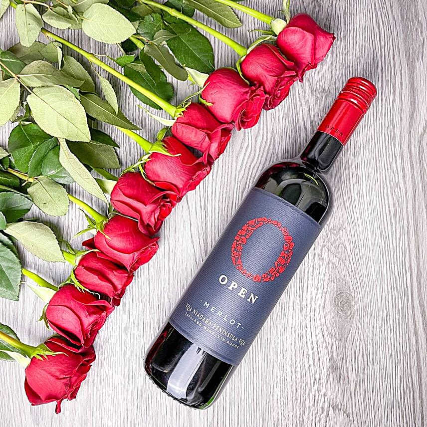 Red Roses Bouquet And Red Wine