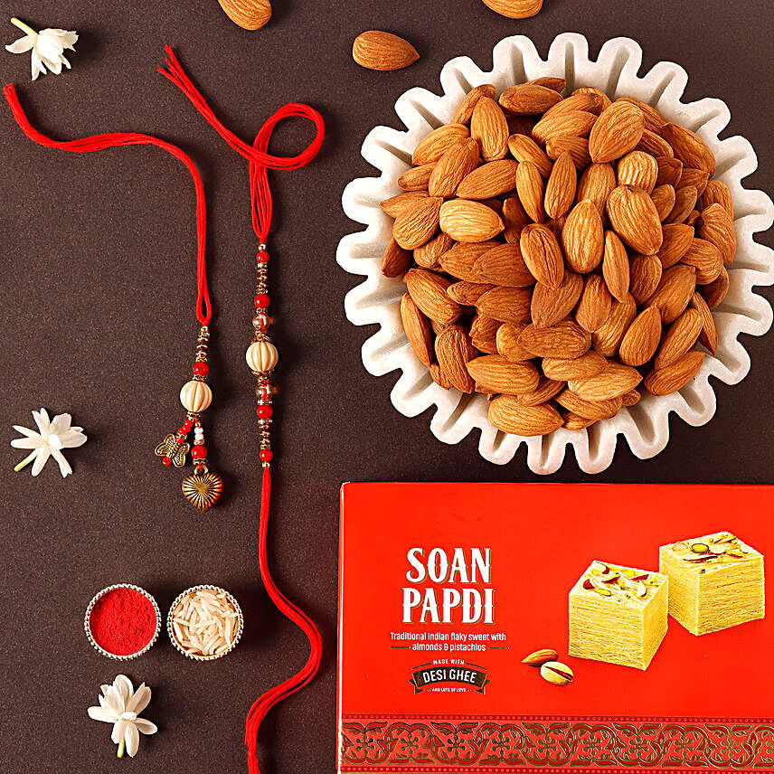 Sneh Alluring Rakhi Set With Soan Papdi & Almonds