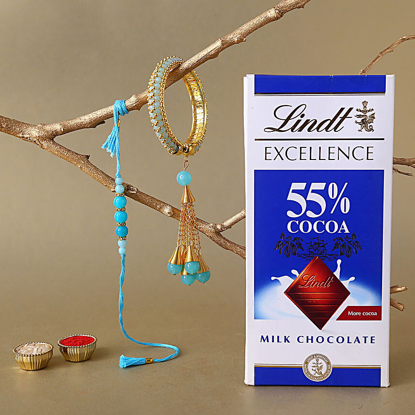 Sneh Blue Bhaiya Bhabhi Rakhi & Lindt Bar:Rakhi with Chocolates to Canada
