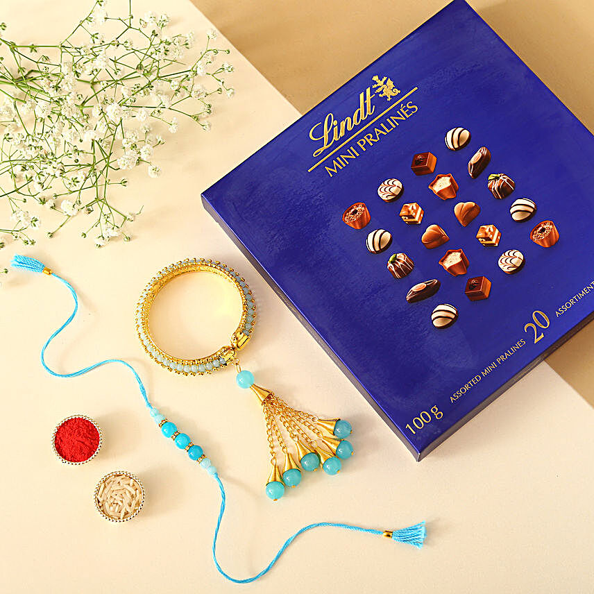 Sneh Blue Rakhi Set & Lindt Mini Pralines:Designer Rakhi to Canada