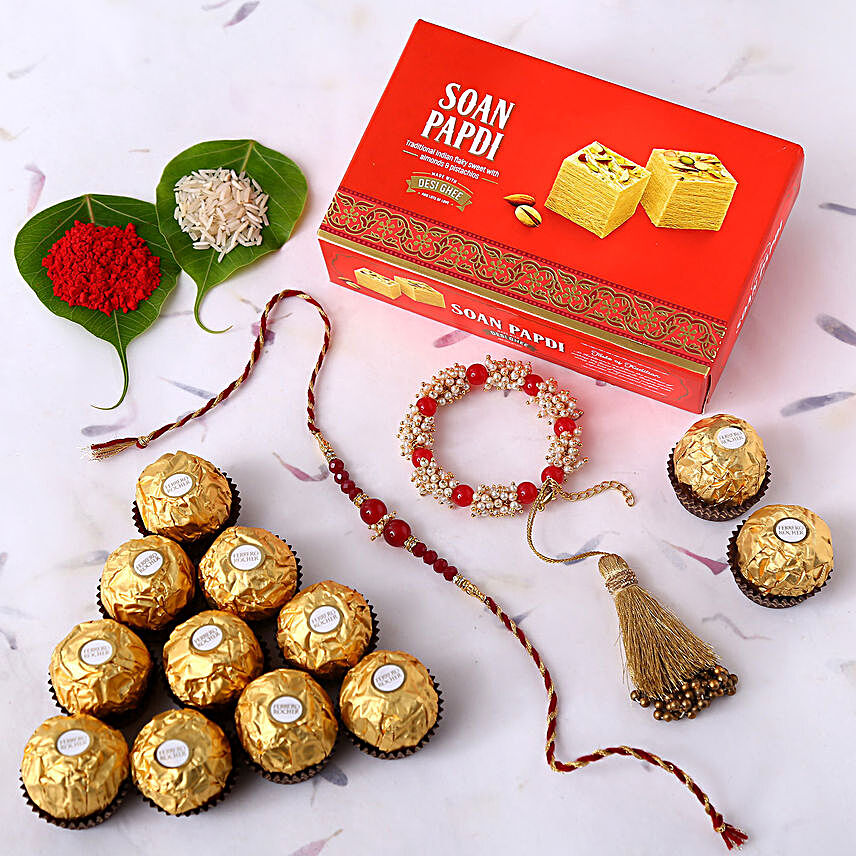 Sneh Red Rakhi Set With Soan Papdi & Ferrero Rocher