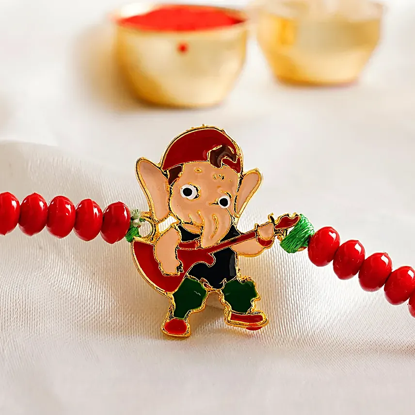 Appealing Bal Ganesha Kids Rakhi And Soan Papdi