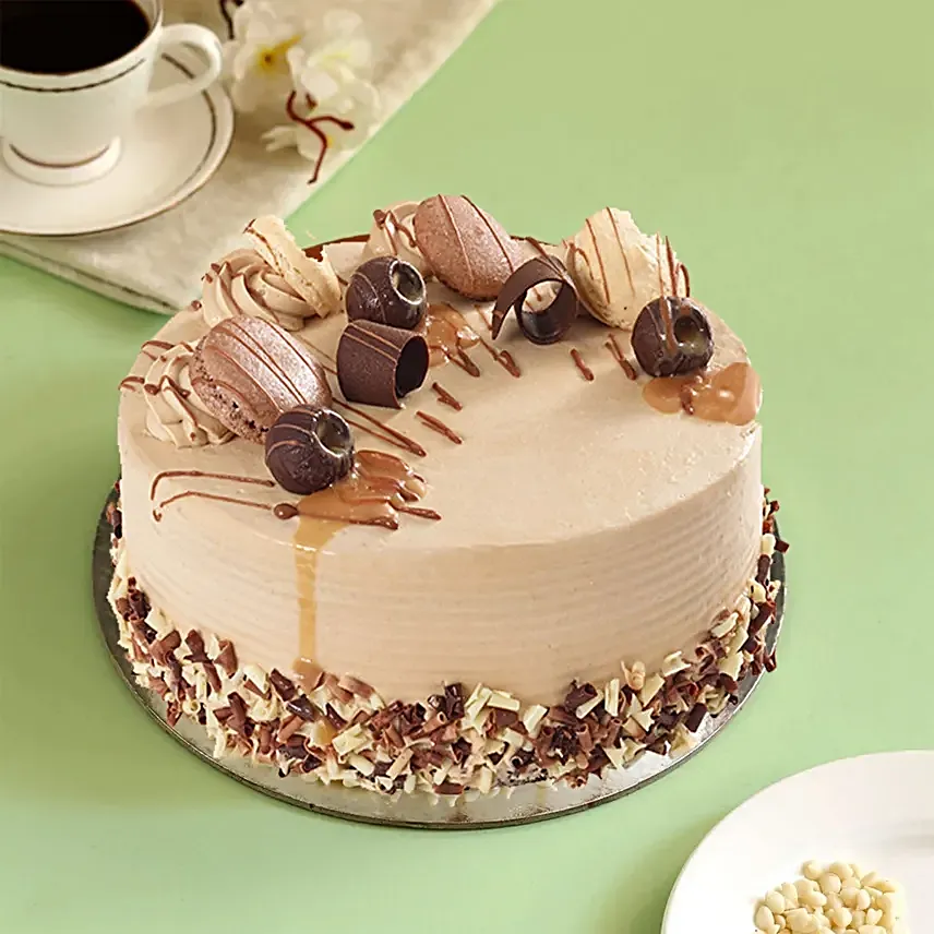 Dripping Caramel Cake