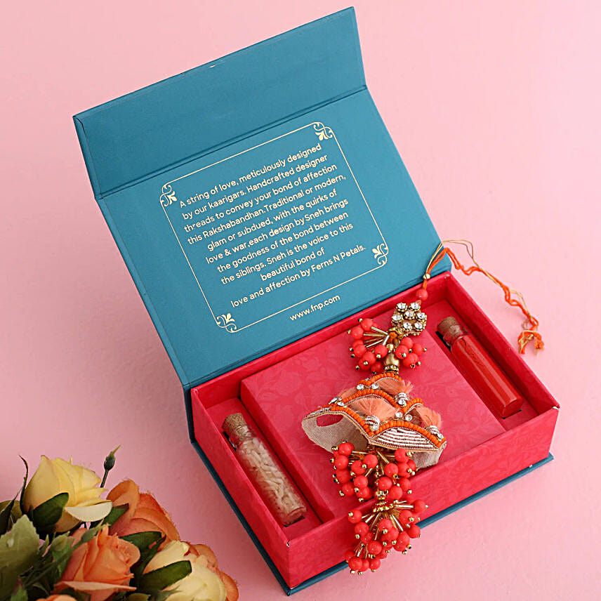 Elegant Lumba Rakhi with Rasgulla