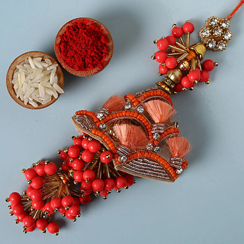Elegant Lumba Rakhi with Rasgulla