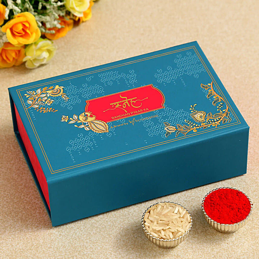 Elegant Lumba Rakhi with Rasgulla
