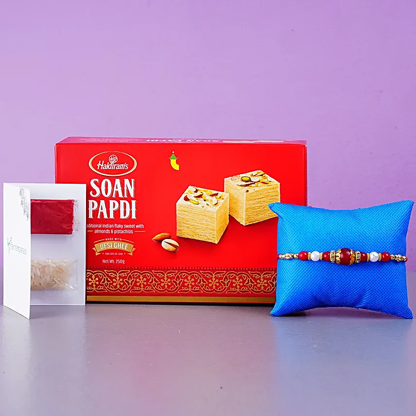 Elegant Pearl Thread Rakhi And Soan Papdi