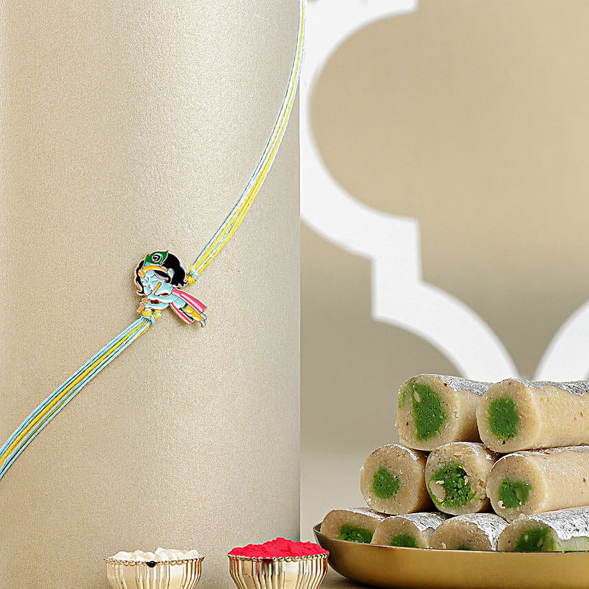 Melodic Krishna Rakhi For Kids N Kaju Roll Delight