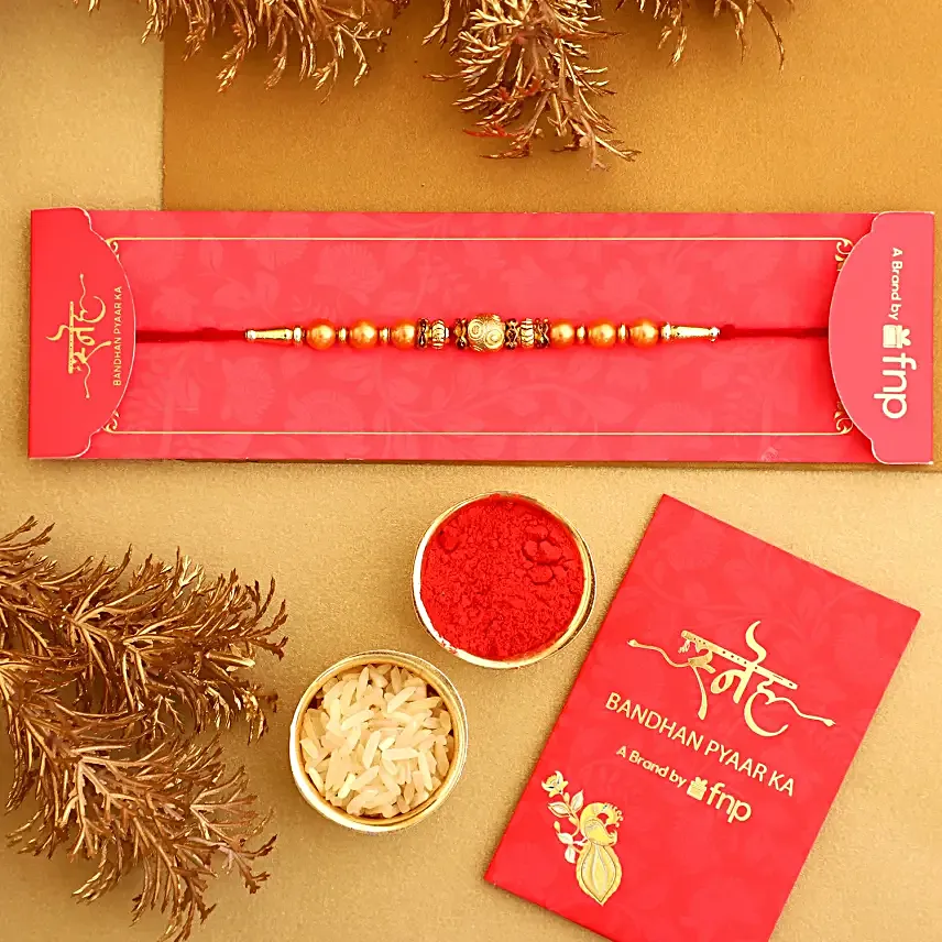 Rose Gold Rakhi N Delights Hamper
