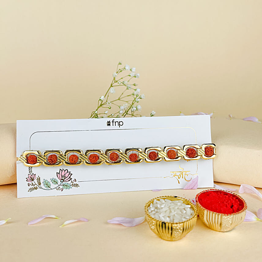 Rudraksha Embellished Rakhi N Ganesha Blessings Idol