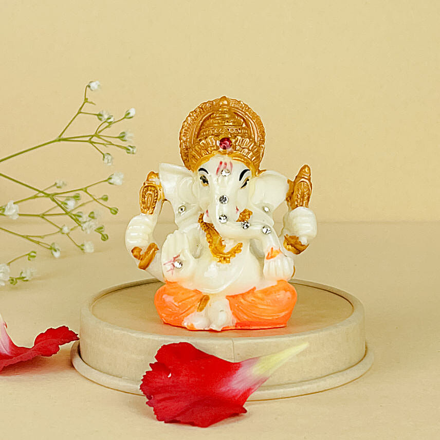 Rudraksha Embellished Rakhi N Ganesha Blessings Idol