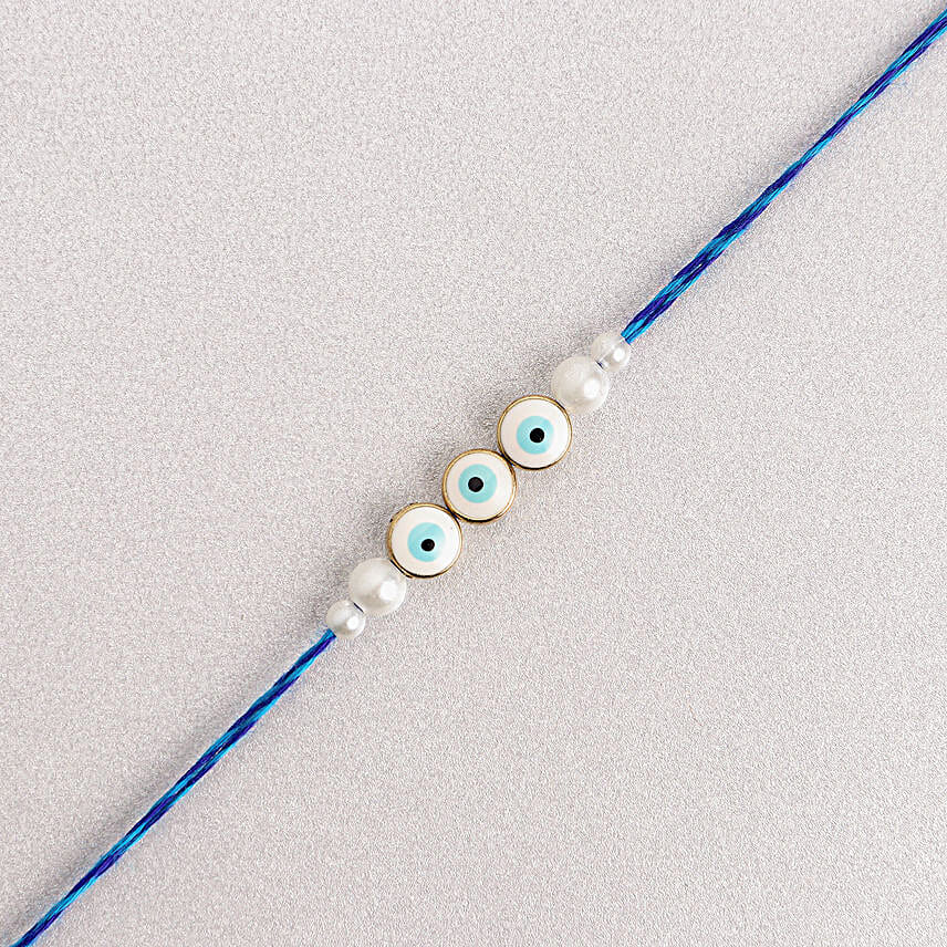 Simplistic Blue Evil  Eye Rakhi N Besan Laddoo Delight