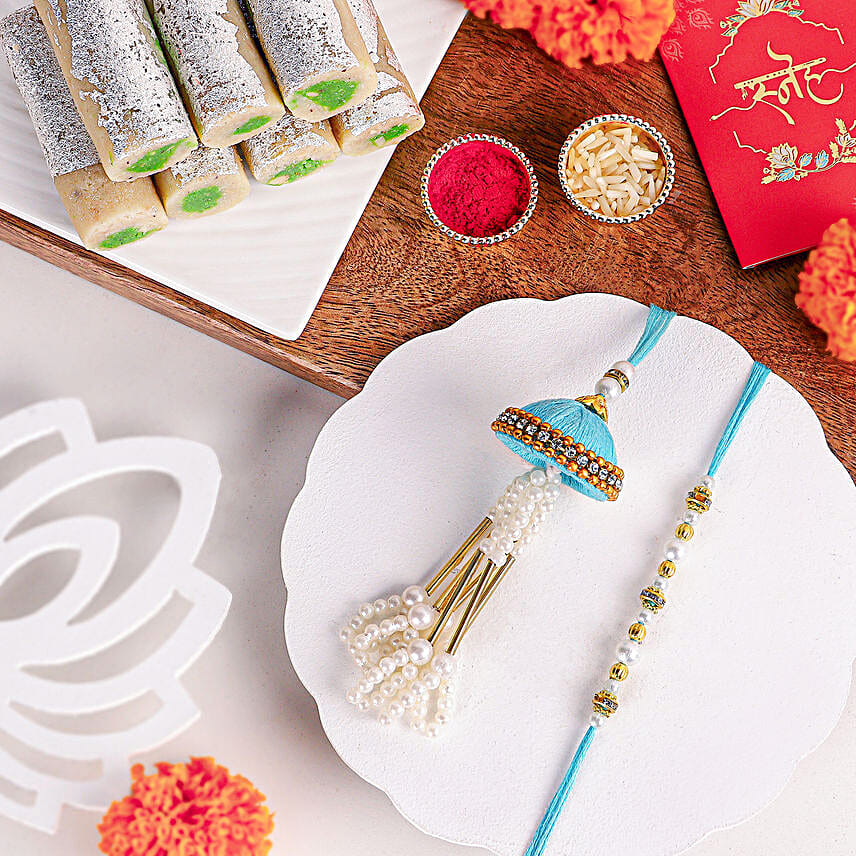 Tranquil Jhumar Bhaiya Bhabhi Pearl Rakhi Set N Kaju Roll
