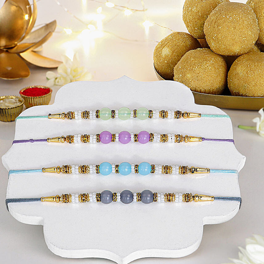 Zen Beadwork Rakhi Set N Besan Laddoo Delight