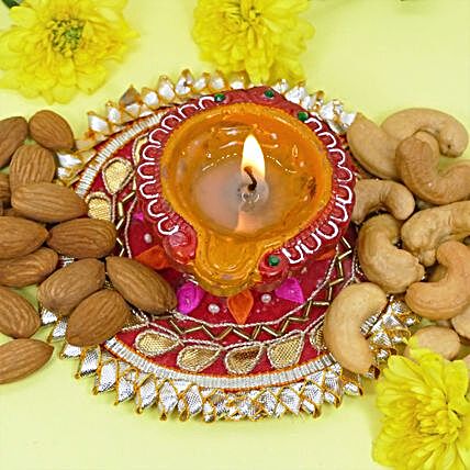 Diwali Celebration Gold Wax Diyas And Dry Fruits