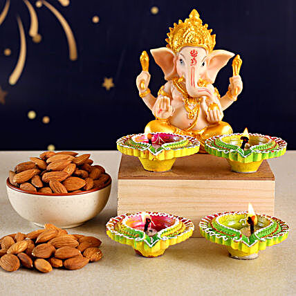 Ganesha Idol With Almonds And 4 Green Diyas:Diwali Dry Fruits