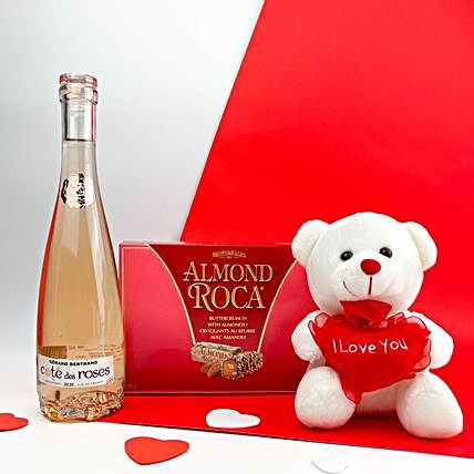 V Day Candies With Teddy And Sparkling Wine