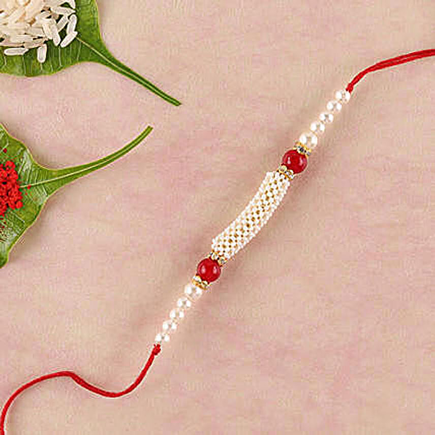 Gorgeous White And Red Beads Rakhi:Send Rakhi to China