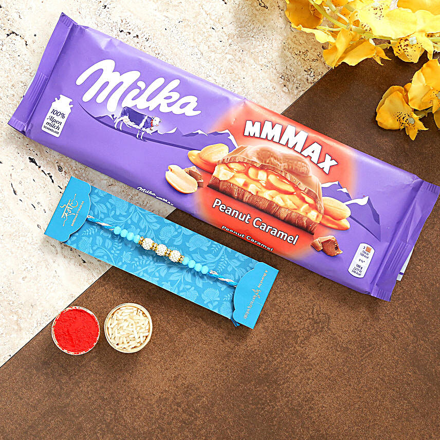 Sea Blue Pearl Rakhi And Milka Peanut Chocolate