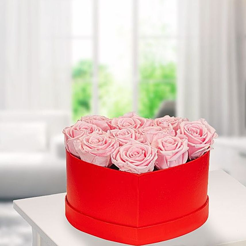 10 Light Pink Roses In A Red Heart Shaped Box