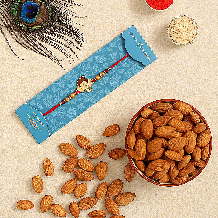 Long Trunk Bal Ganesha Kids Rakhi And Healthy Almonds:Rakhi for Kids in Germany
