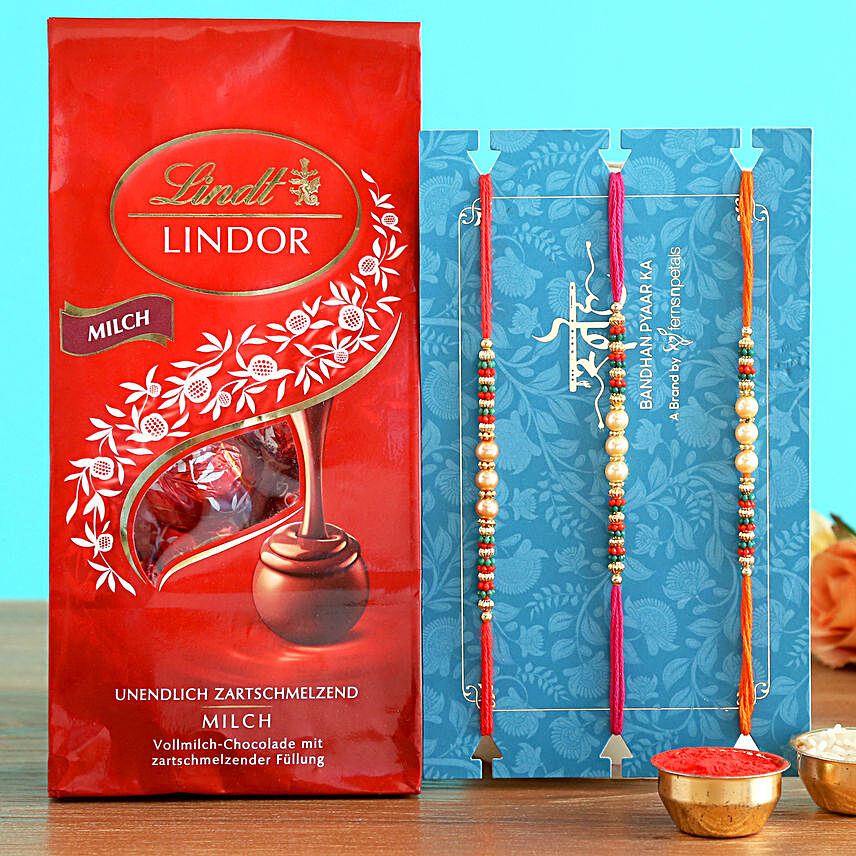 Set Of 3 Pearl Rakhis And Lindt Lindor Milch Chocolates