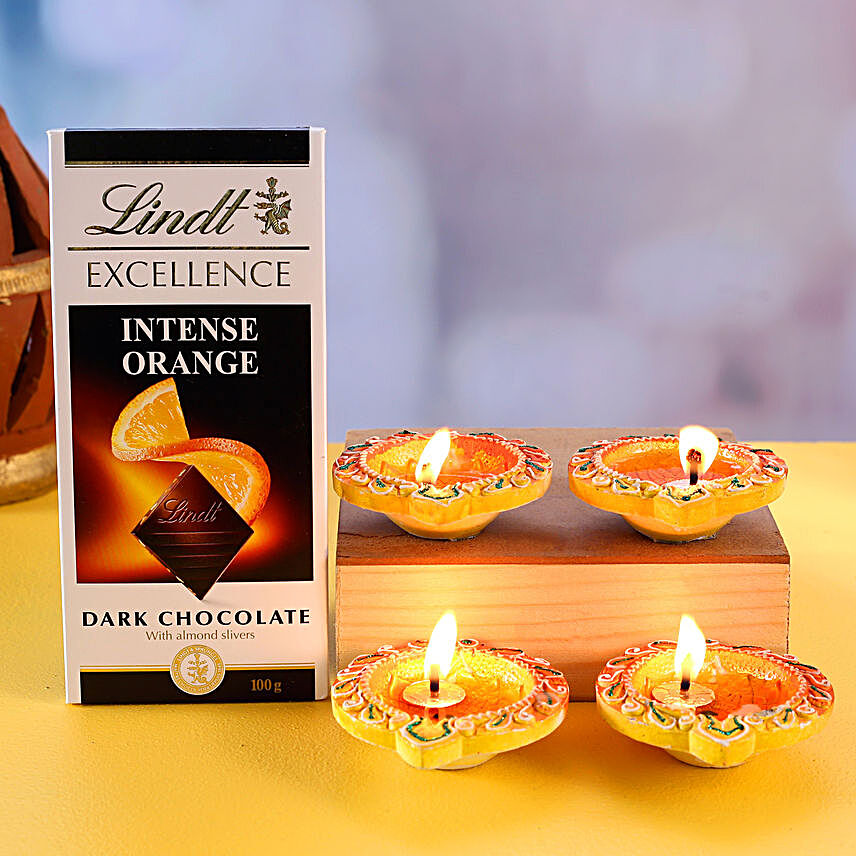 Set Of 4 Traditional Diyas And Lindt Orange Intense Dark