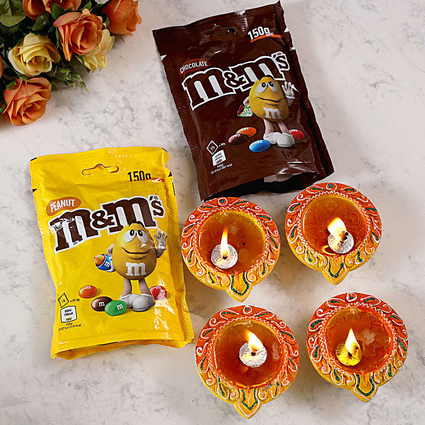 Set Of 4 Traditional Diyas And Mandm Chocolates