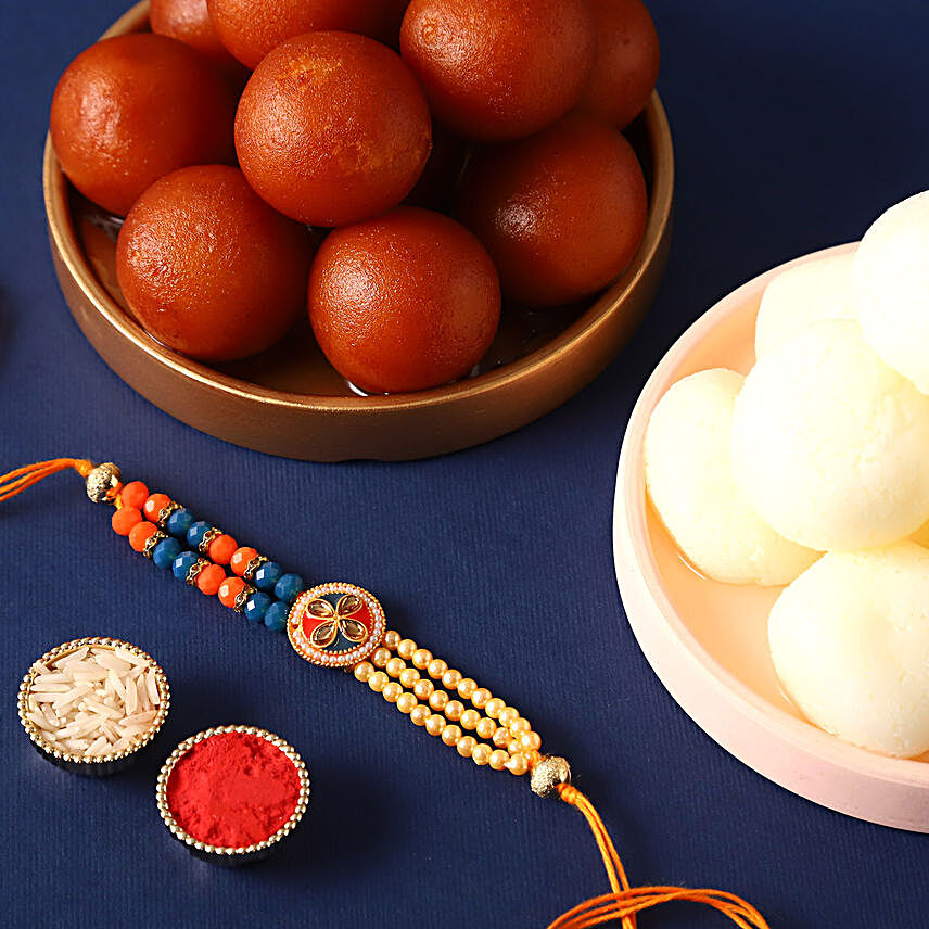 Sneh Elegant Beads Rakhi & Sweets Tin:Rakhi with Sweets to Germany