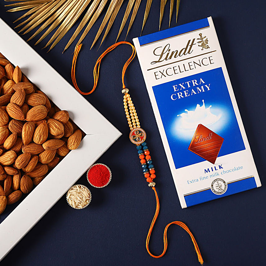 Sneh Fancy Rakhi With Lindt Chocolates & Almonds:Rakhi and Chocolates to Germany