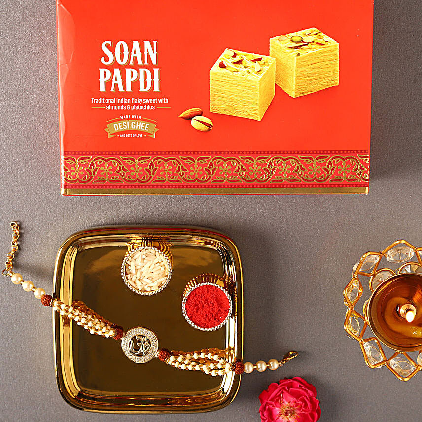 Sneh Om Pearl Rakhi & Soan Papdi:Rakhi and Sweets to Germany