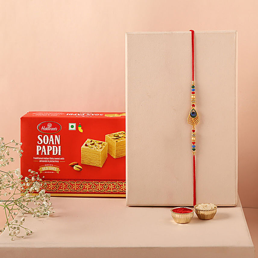 Sneh Peacock Feather Rakhi & Soan Papdi:Rakhi with Sweets to Germany