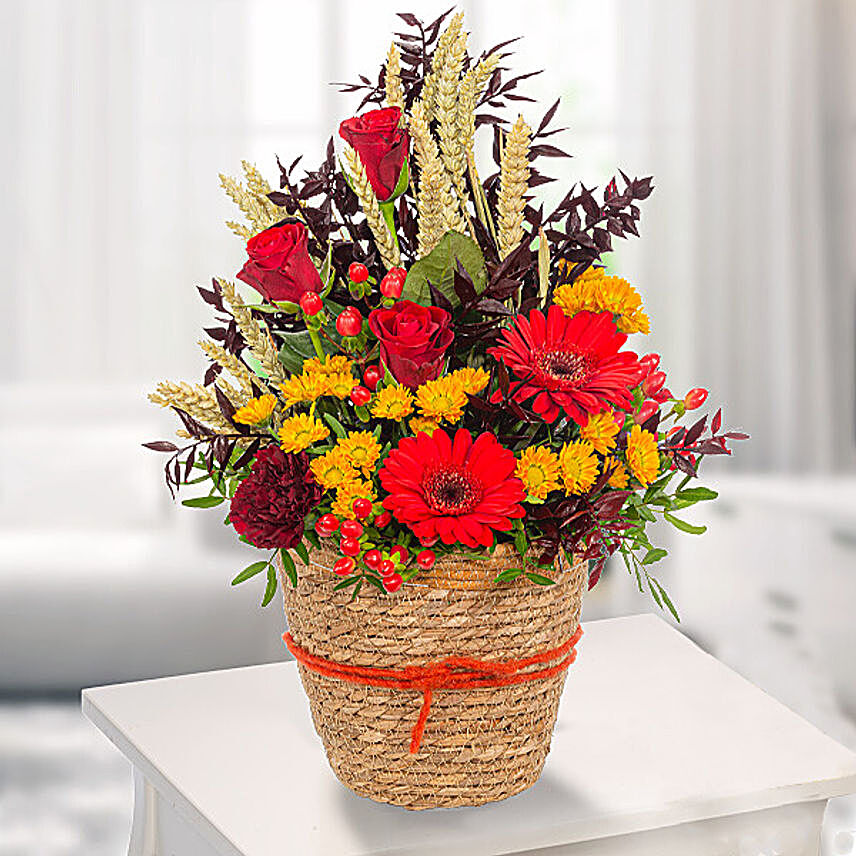 Exotic Blooms Wicker Basket With Free Chocolates:Mixed Flowers to Germany
