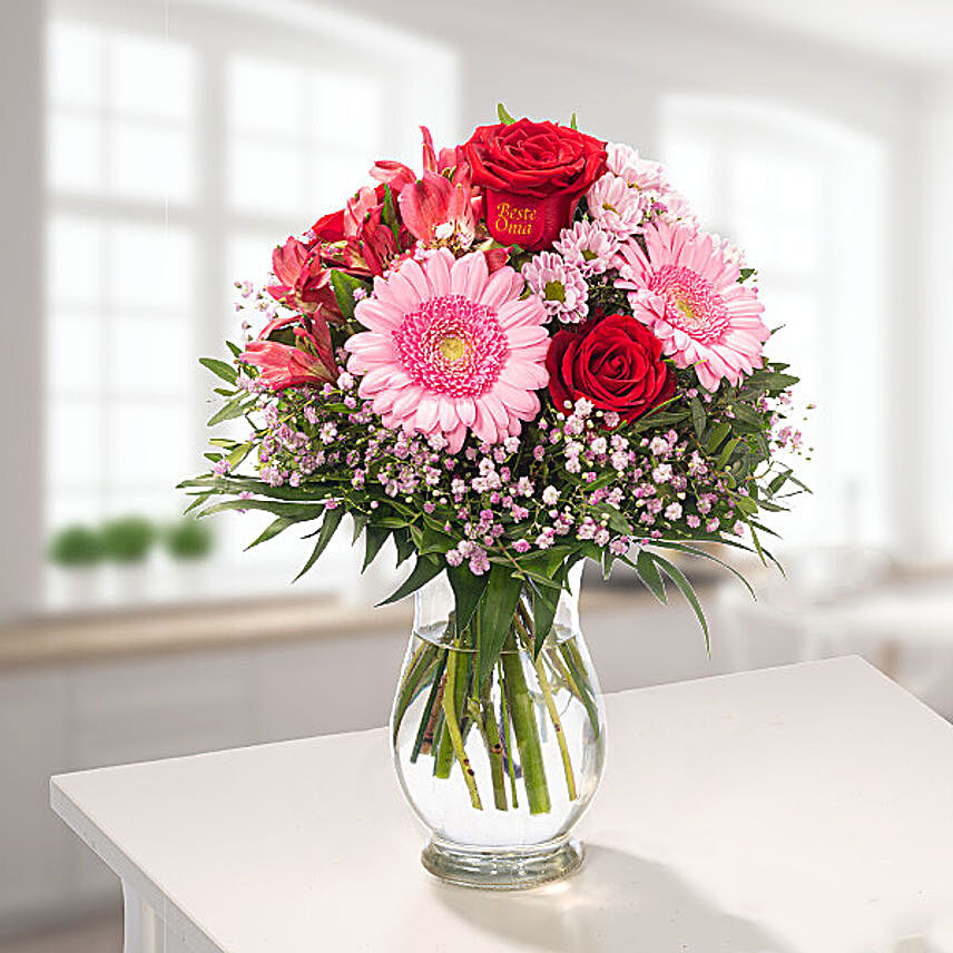 Magnificent Blooms With Free Vase & Chocolates:Carnation Flowers to Germany
