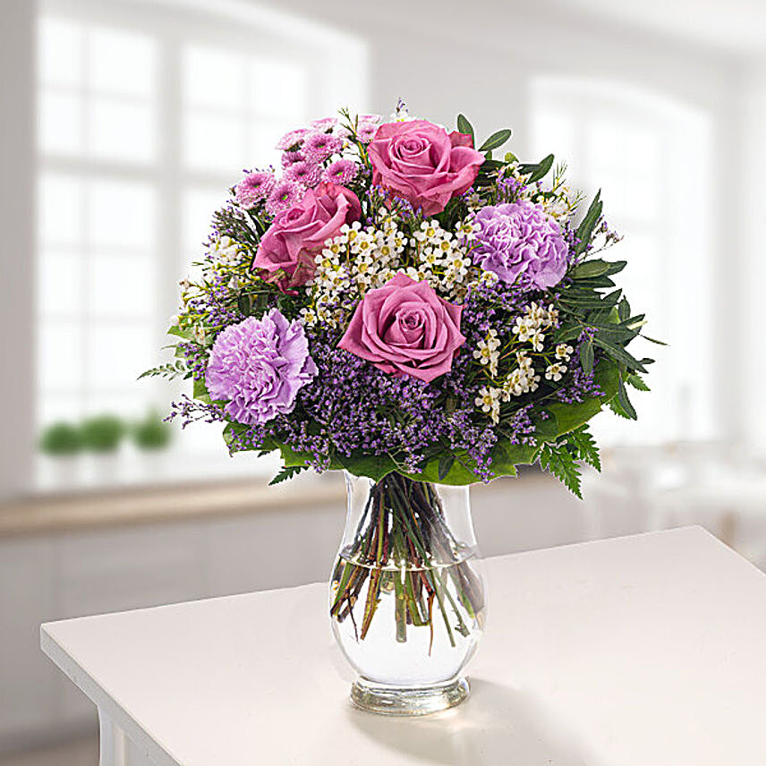 Mesmerising Blooms With Free Vase & Chocolates:Carnation Flower to Germany