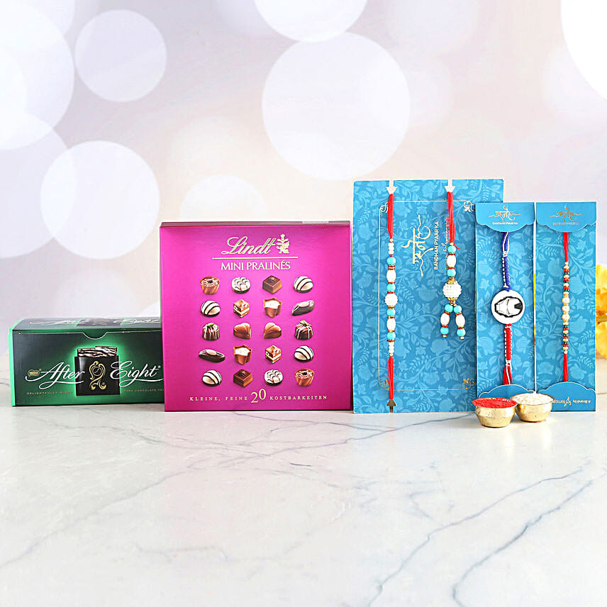 4 Striking Rakhis And Flavourful Chocolate Hamper