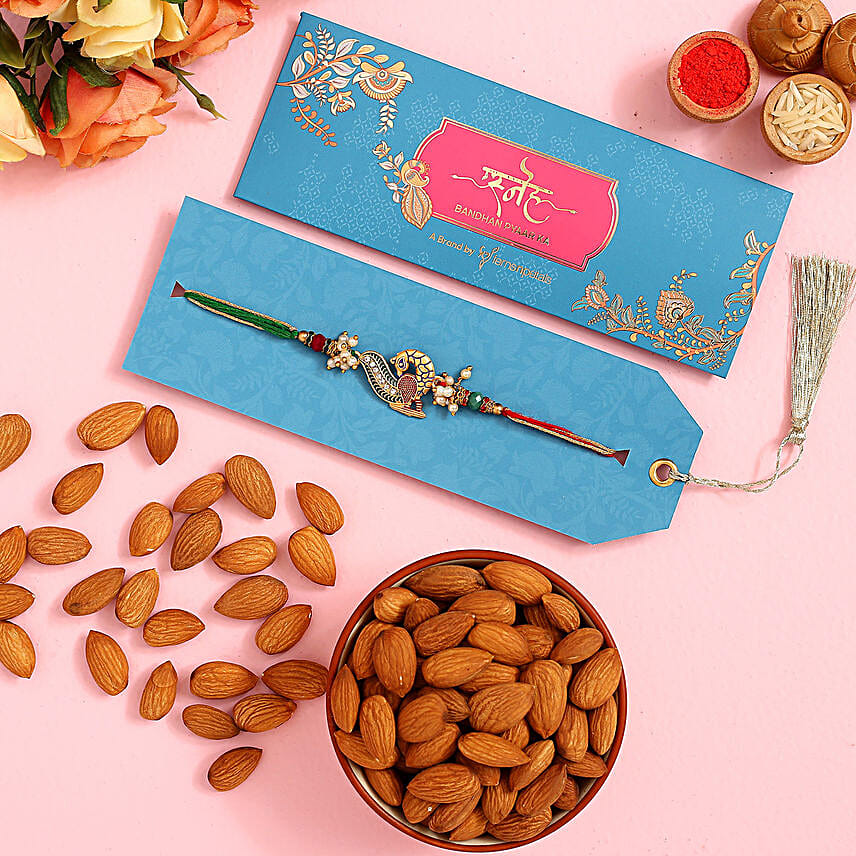 Beautiful Peacock Designer Rakhi And Healthy Almonds